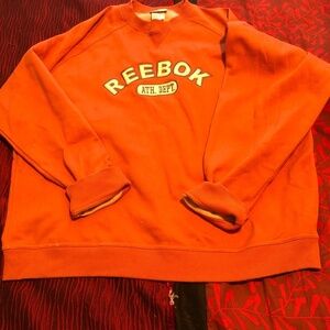 Vintage Reebok large man’s orange sweatshirt, used but in good shape